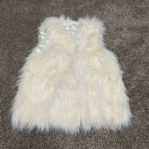 Like new faux fur white vest. Size small.